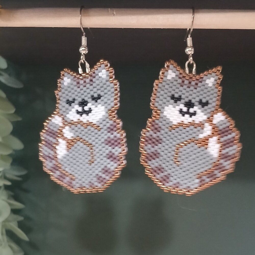 Handmade indigenous beadwork - cats